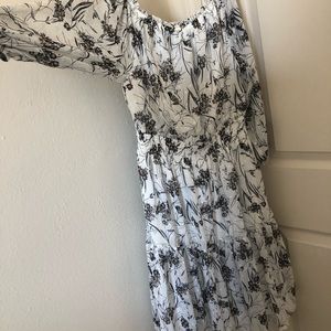 Off shoulder dress with floral ruffles